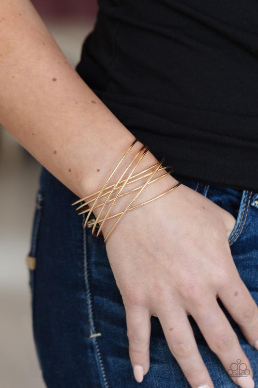 Strike Out Shimmer - Gold Paparazzi Bracelet